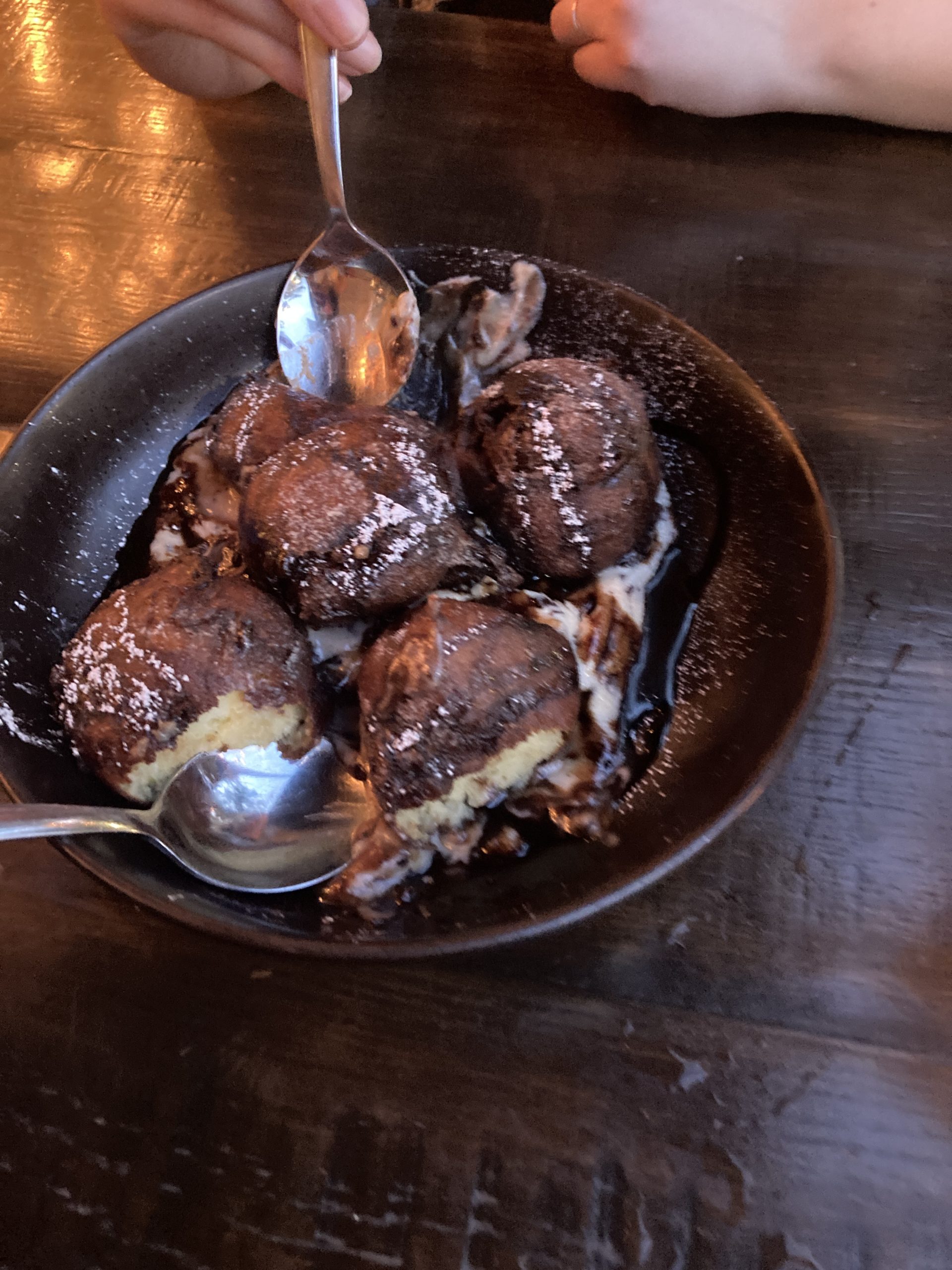 italian donuts over cannoli filling